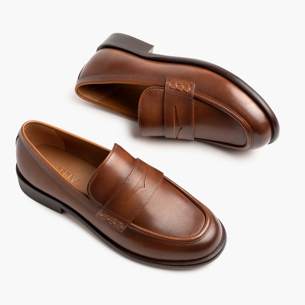 High-Traction Rubber Outsole & Lug Tread Pattern on Dress Penny Pecan Läderkängor för Dam