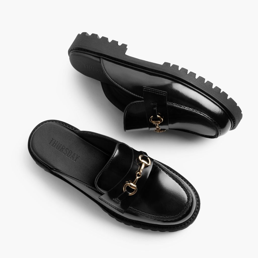 High-Traction Rubber Outsole & Lug Tread Pattern on Penny Mule Svart & Gold Läderloafers för Dam