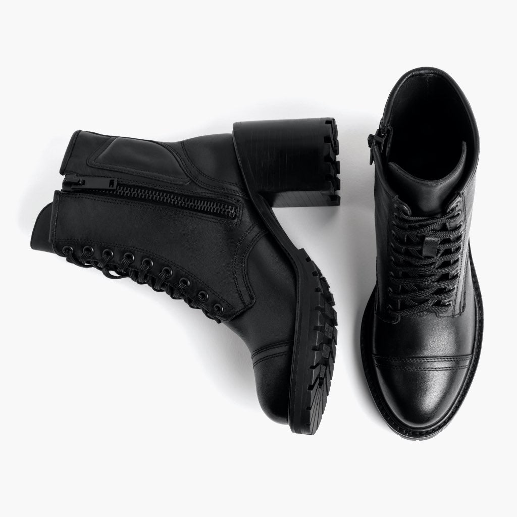 High-Traction Rubber Outsole & Lug Tread Pattern on Rebel Svart Läderkängor för Dam
