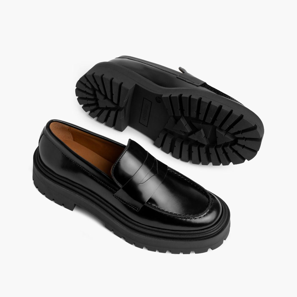 High-Traction Rubber Outsole & Lug Tread Pattern on Penny Platform Svart Läderloafers för Dam