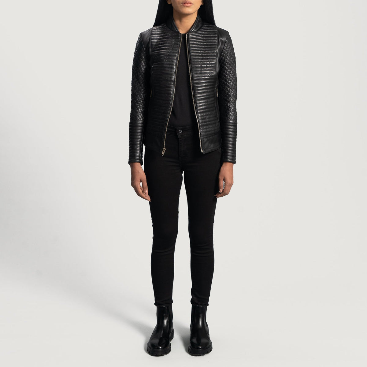 Close-Up Detail of Varsity & Zipper Hardware on Women's Cityscape Black Leather Biker Jacket