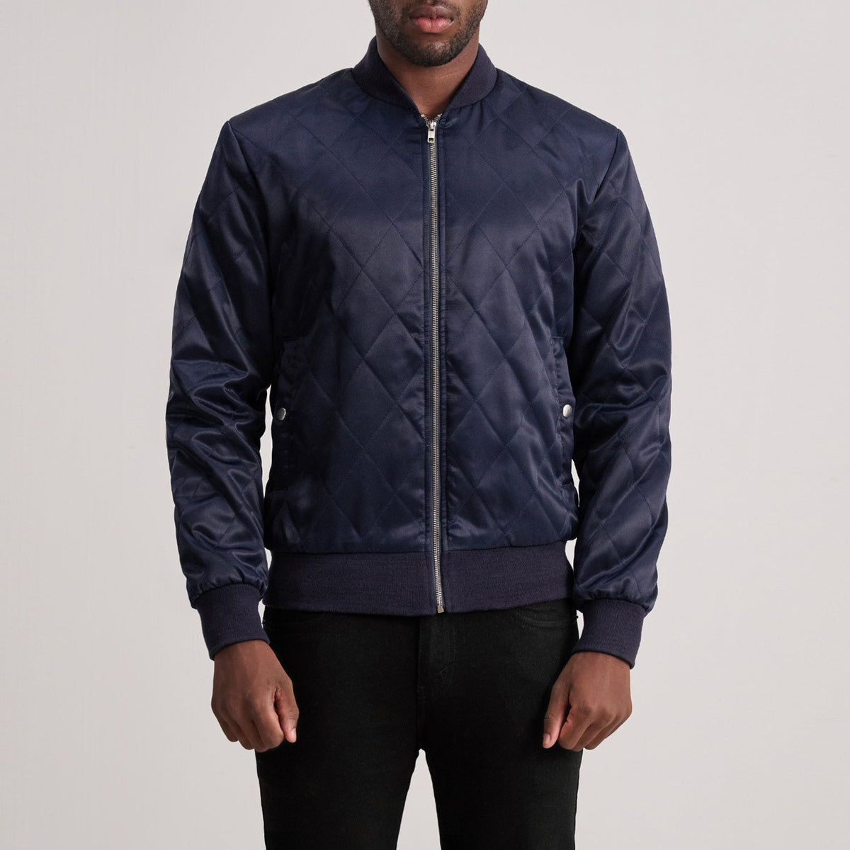 Danson Quilted Blue Varsity Läderjacka för Herr in Blue Satin - Front Profile View &amp; Tailored Silhouette | Buy Online