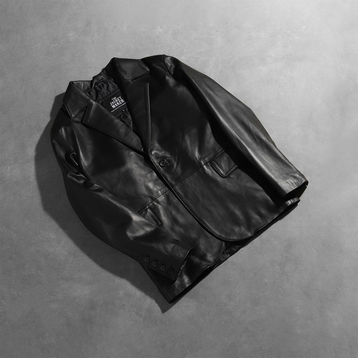 Open Hem &amp; Hem Craftsmanship Construction Detail on Men's Daron Svart Leather Blazer för Herr