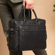 
Classic 100% Full-Grain leather Briefcase - Bakifrån med förstärkta läderremmar och sömmar