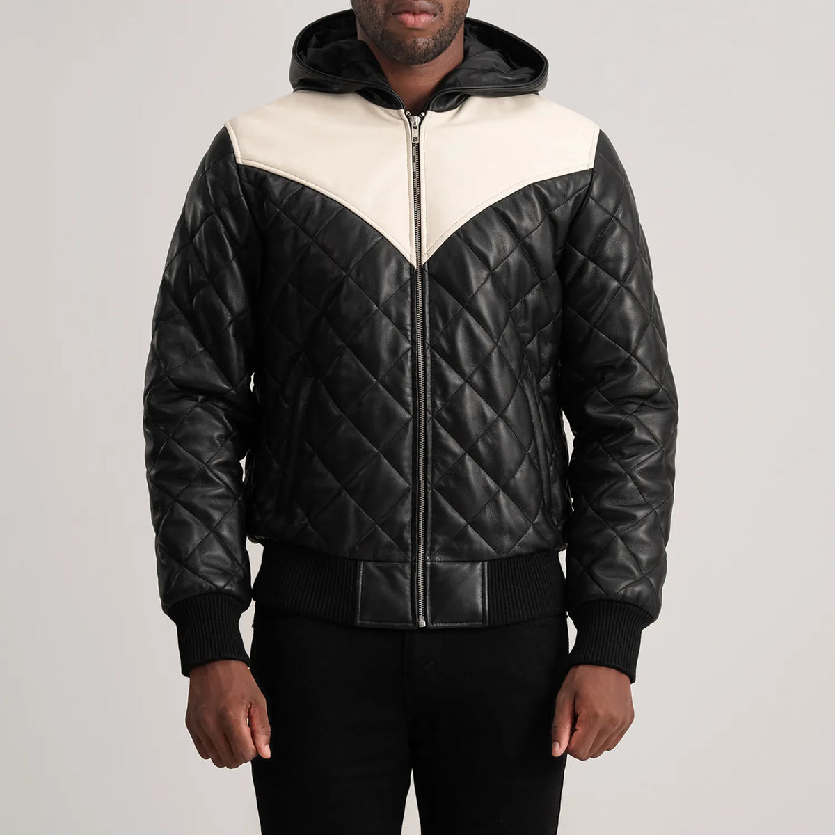 
Närbildsdetalj of Hooded & Zipper Hardware on Norman Tan Hooded Bomber Leather Puffer Jacket