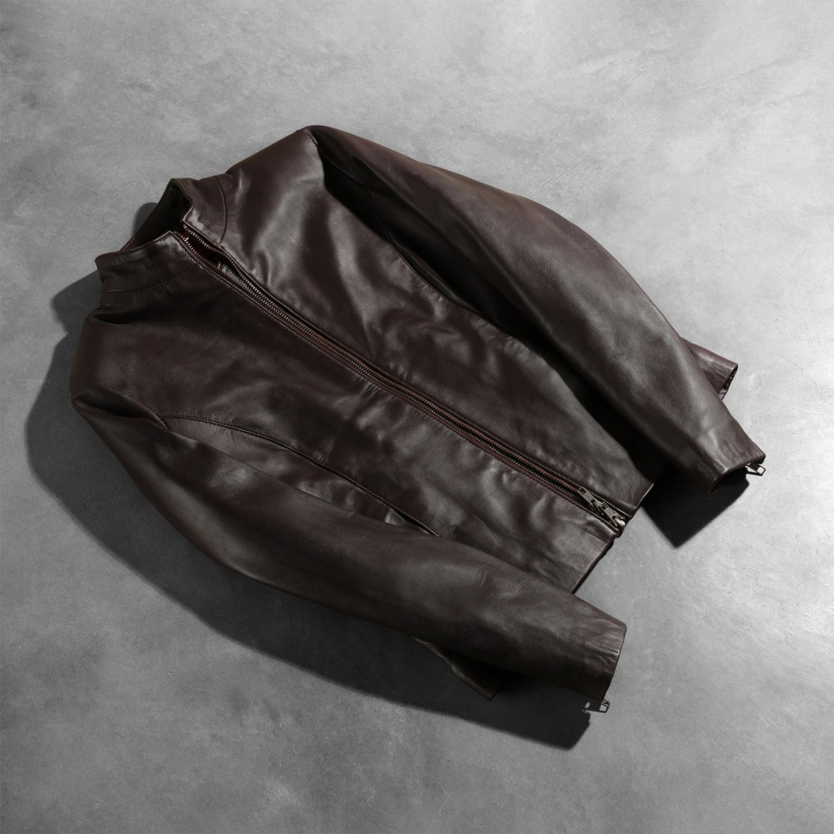 Zipper &amp; Hem Craftsmanship Construction Detail on Women's Rumella Maroon Leather Biker Jacket